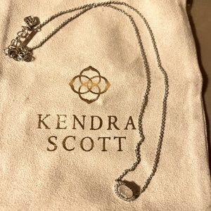 Silver necklace with iridescent pendant